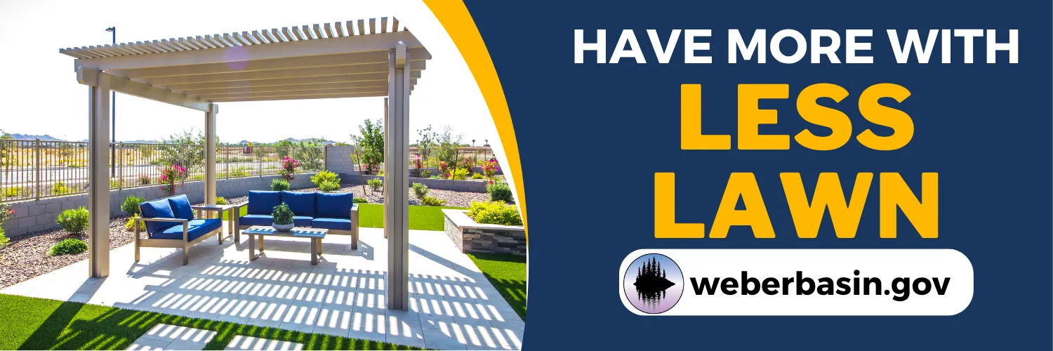 Have more with less lawn. A shaded patio with outdoor furniture surrounded by low-water plants. weberbasin.gov